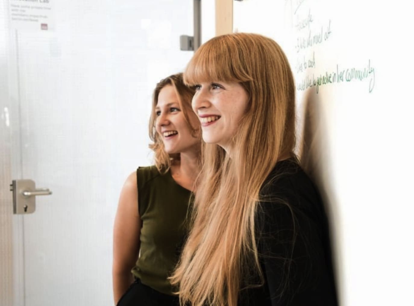 Two women smiling